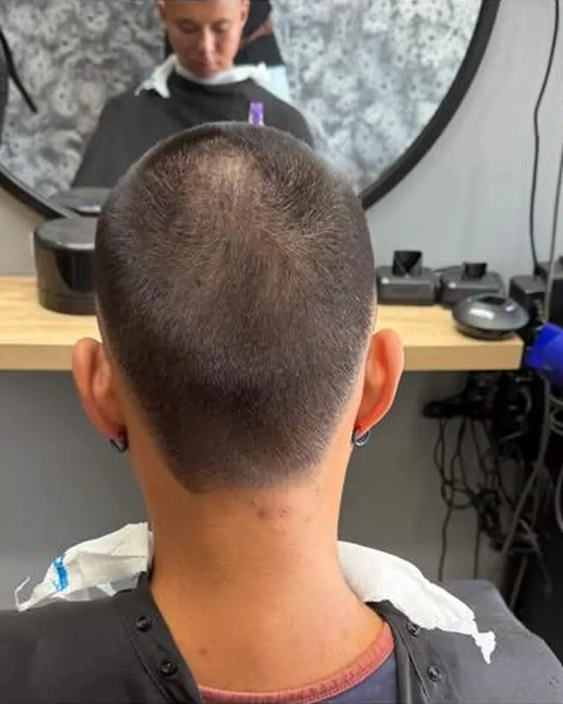 Buzz cut with a clean neckline, back view