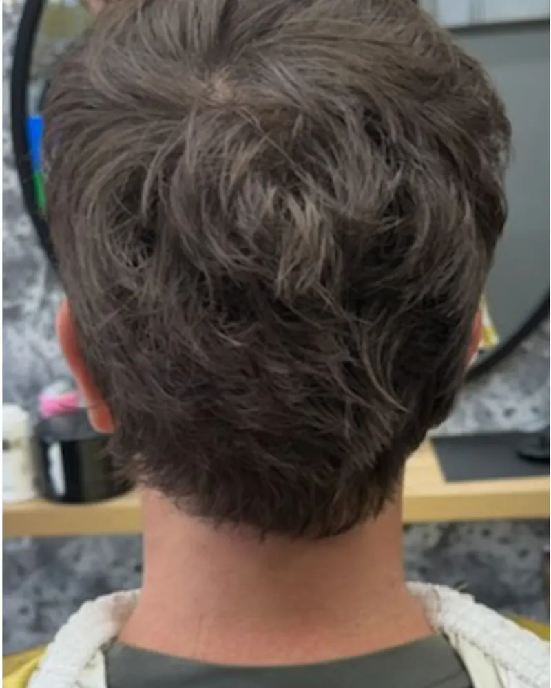 Textured crop from behind with a tidy tapered neckline